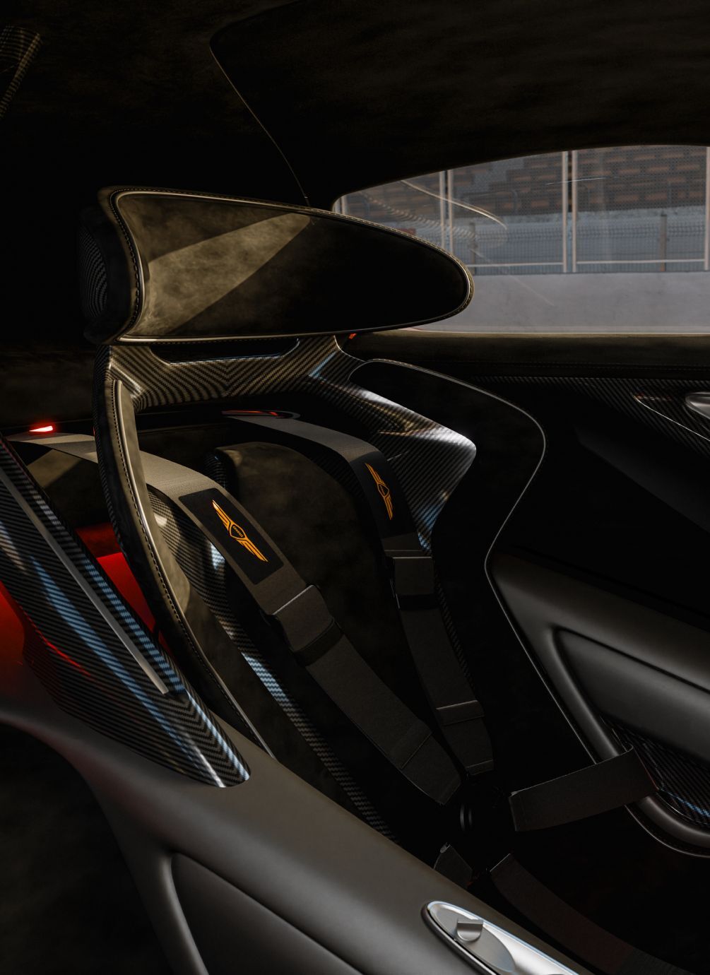 An angled view of the X Gran Racer Concept’s interior reveals both the driver and passenger seats, reclined further back than in typical cars. The interior is elegantly crafted in black and silver tones.